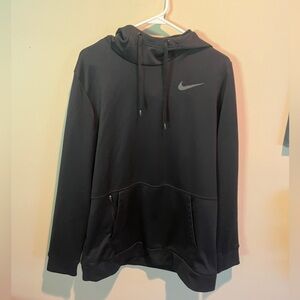 Nike men’s large black hoodie. Fleece inside zipper pocket and normal pocket